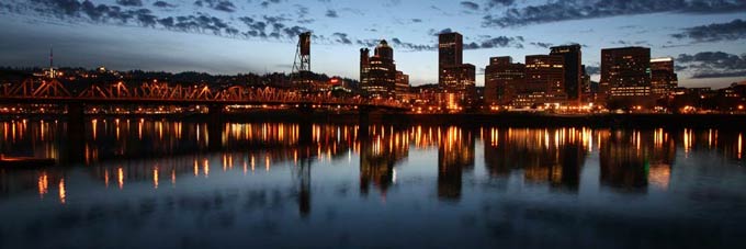 Portland skyline reflected in the Willamette River at dusk